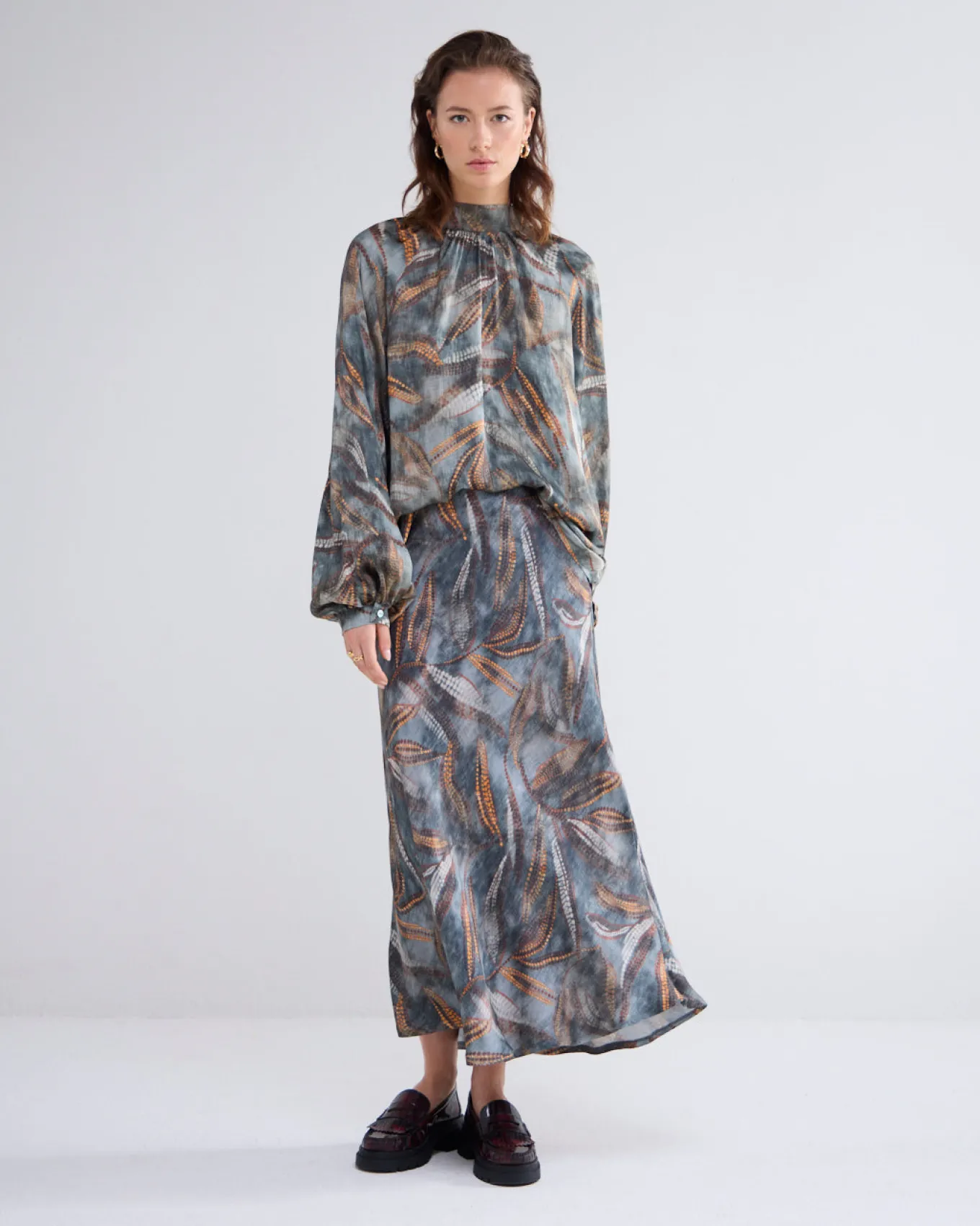 in_top_met_raglanmouwen_1.webp 2-in-1 Top Met Raglanmouwen>Summum Online