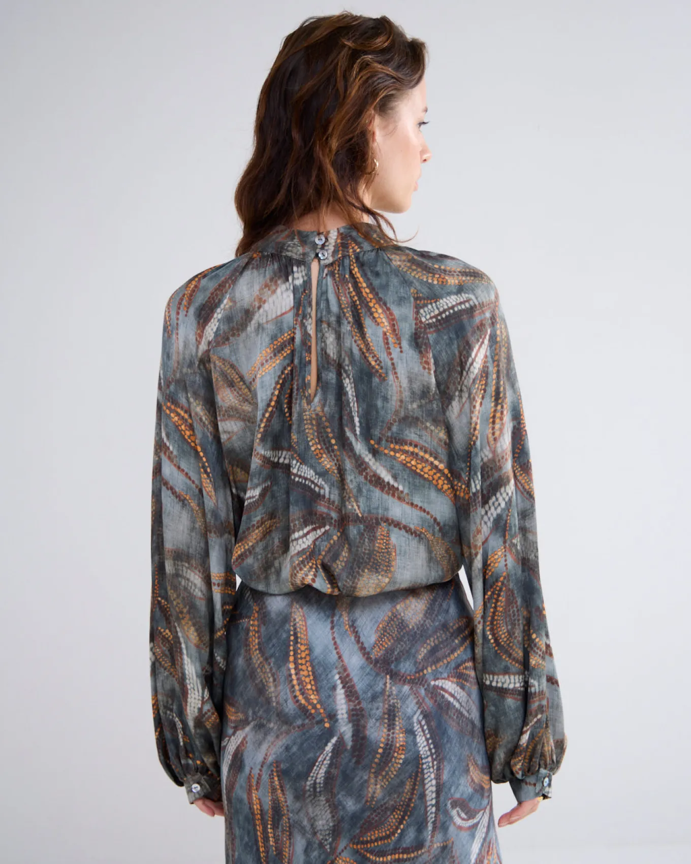 in_top_met_raglanmouwen_2.webp 2-in-1 Top Met Raglanmouwen>Summum Online